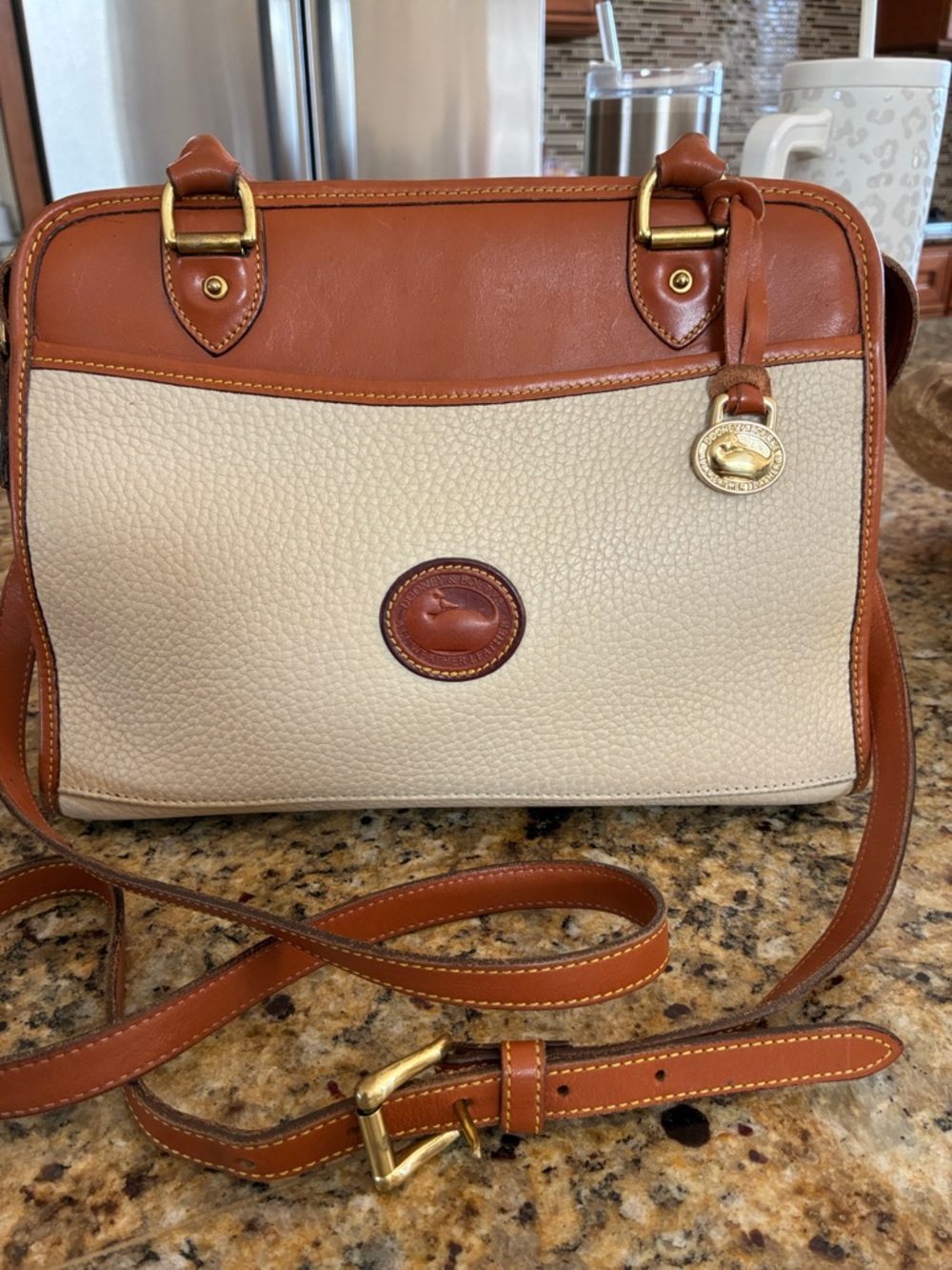 Classic Dooney & Bourke Cream Pebbled Crossbody with Brown Leather Trim